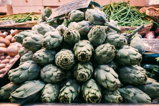 Pile of artichokes in greengrocer's