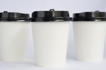 photo white cup plain on white background , mock up glass plastic