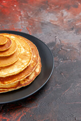 Vertical view of half shot homemade pancakes