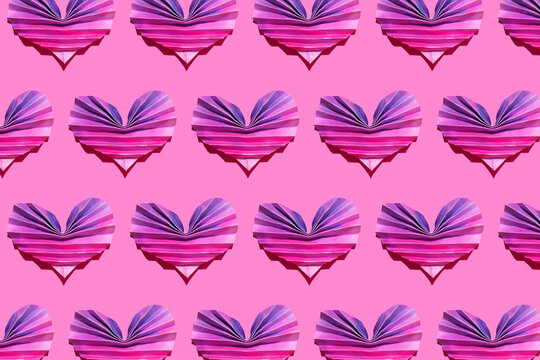 Pattern of pink and purple origami hearts