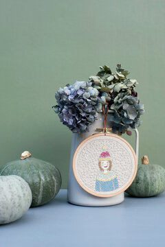 Pumpkins, jug with dried hydrangeas and winter motif&Ocirc;&oslash;&Omega;embroidery