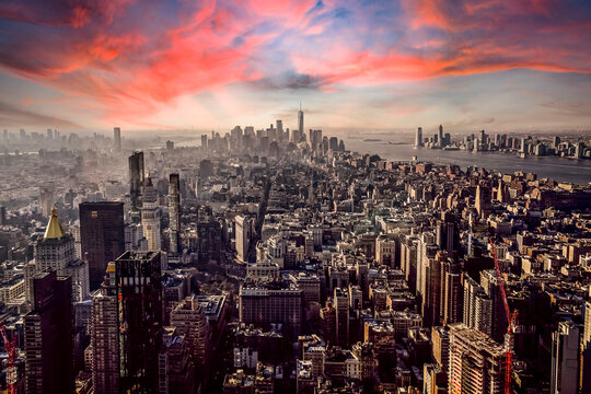 Aerial View Of New York City Against Orange Sky During Sunset, New York, USA