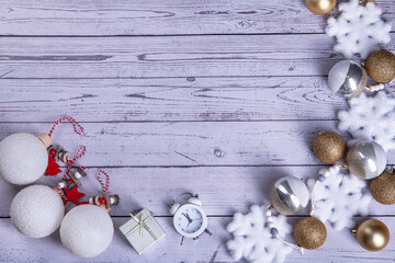 Christmas background with decoration on wooden board via composition with copy space Flat Lay
