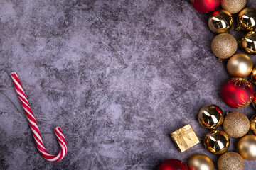 Fototapeta na wymiar Christmas background with decoration on concrete board via composition with copy space Flat Lay