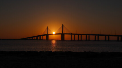 Abudhabi bridge at sunset near al hudayriat island 