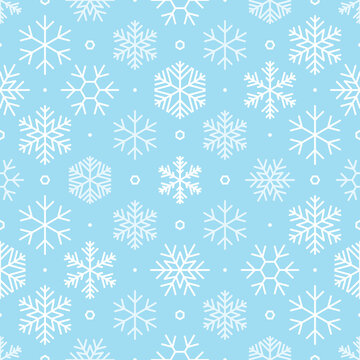 Blue christmas snow background winter snowflake seamless pattern. Great for holidays season wallpaper, xmas backdrops, packaging, scrapbooking, or giftwrap projects. Surface pattern design.