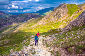 Fototapeta premium Toourist hiking in Snowdon National park in North Wales. UK