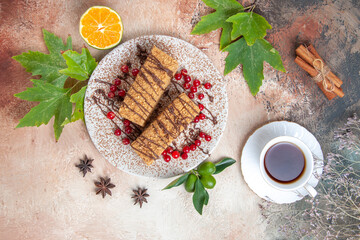 top view cake slices with tea on light background sweet biscuit cake choco
