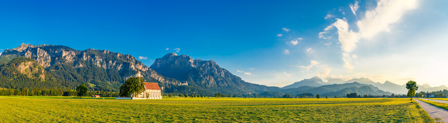 Fototapeta premium Sunny mountain panorama of Schwangau