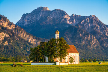 St. Coloman church with Telberg mountain peak in Schwangau. Southern Germany