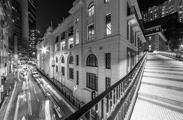 Traffic in old street of central district of Hong Kong city at night
