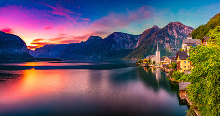 Beautiful summer Alpine Hallstatt Town panorama and lake Hallstatter at dawn. Austria