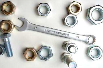 wrench with fasteners on a white background