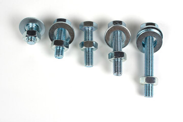 several fixing bolts with nuts close-up