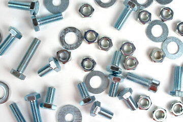 bolts of different sizes with nuts on a white background