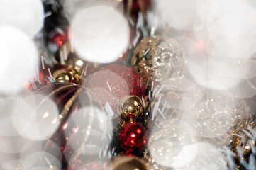 Red and gold Christmas decorations on the Christmas tree. Close up. Macro photo. Holiday. Happy Christmas.