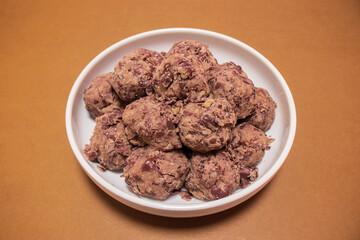 Korean traditional rice cake made from the glutinous rice and coated with mashed adzuki beans. homemade food, Injeolmi, tteok.