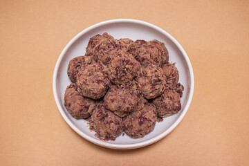 Korean traditional rice cake made from the glutinous rice and coated with mashed adzuki beans. homemade food, Injeolmi, tteok.