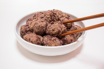 Korean traditional rice cake made from the glutinous rice and coated with mashed adzuki beans. homemade food, Injeolmi, tteok.