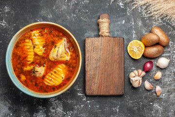 Variety of food chicken meal and cutting board on the table