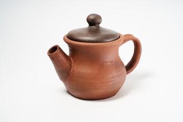 ceramic product with your own hands, made on a Potter's wheel, isolated on a white background