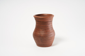 ceramic product with your own hands, made on a Potter's wheel, isolated on a white background