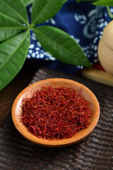 Close-up pictures of traditional Chinese medicine saffron on the background of retro Chinese style