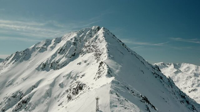 White Snow-Capped Mountain Peaks and Ski Resort Slopes, Bulgaria - Aerial