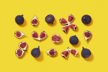 Fresh figs whole and sliced figs on yellow background. Food pattern inscribed in rectangle.