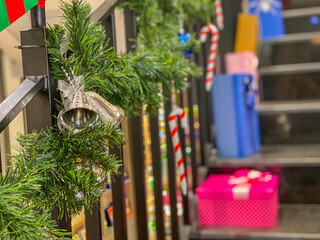 Christmas decoration and Christmas gifts on the stairs in the house