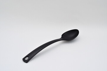 Large spoon on a white background.