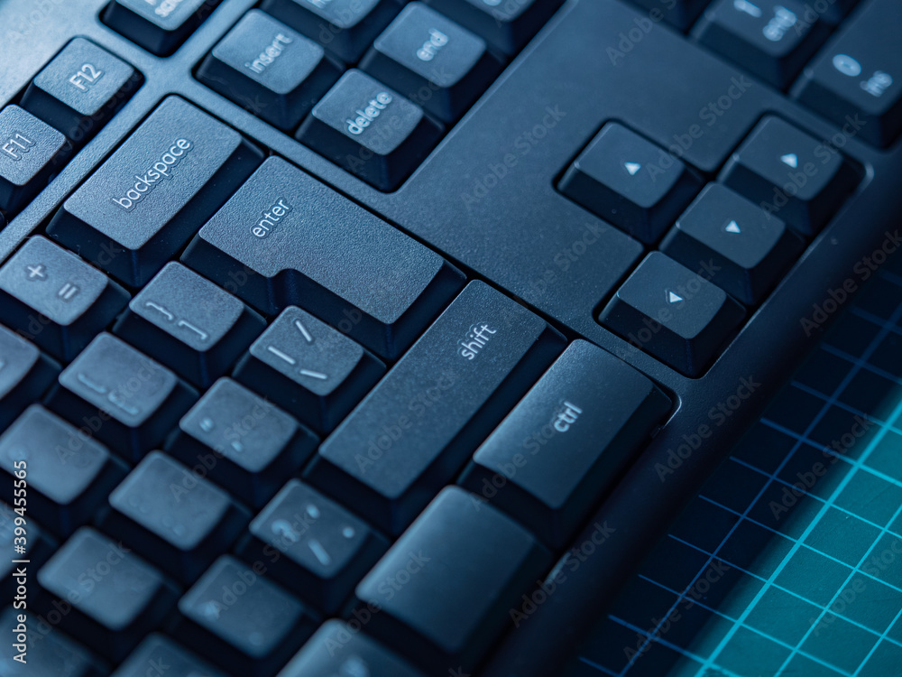 Poster black keyboard close-up. control keys on the keyboard. backspace, enter,shift, delete, and insert ke