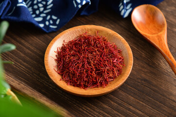 Close-up pictures of traditional Chinese medicine saffron on the background of retro Chinese style