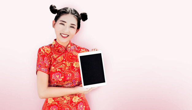 chinese lady show tablet on white