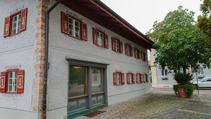 Fototapeta na wymiar Prien am Chiemsee, Bavaria, Germany - August 30, 2018: Interesting houses in the city center