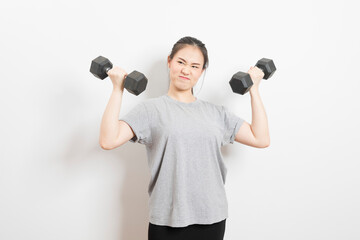 Fototapeta na wymiar Beautiful young Asian woman lifting dumbbells smiling and energetic isolated over white background. Healthy lifestyle.