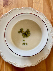 Cream of Jerusalem Artichoke Soup with Pumpkin Seeds. Homemade.
