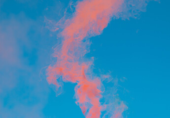 red smoke on a blue background