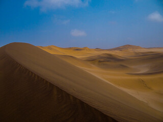 Fototapeta na wymiar Photograph of a sand dune in the Namib Desert