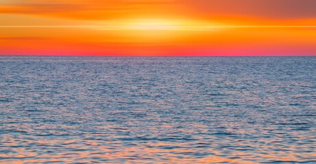 People resting at the ancient Khaju Bridge at twilight blue hour - Isfahan, Iran