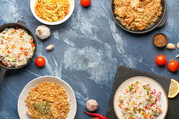 Frame made of tasty pilaf with different ingredients on dark background