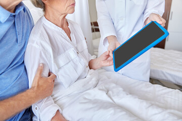 medicine, age, health care and people concept - senior woman, man and doctor with tablet pc computer at hospital ward