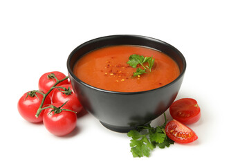Bowl of tomato soup isolated on white background
