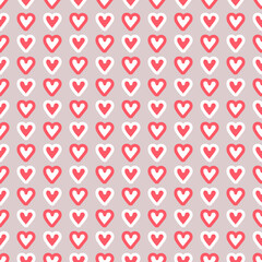 Valentine's day pink hand drawn hearts seamless vector pattern. Part of collection