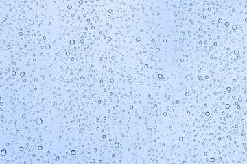 Rain drops on window glasses texture background