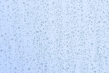 Rain drops on window glasses texture background