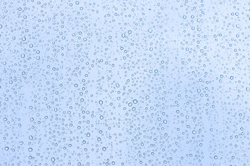 Rain drops on window glasses texture background