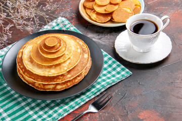Easy prepared simple pancakes and a cup of tea