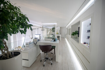 Fototapeta na wymiar Large white room with cosmetic equipment