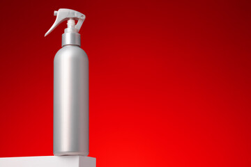 Blank cosmetic skincare container against red background